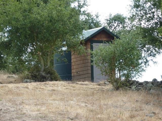 Water storage tank and pump house